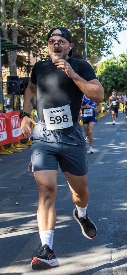 Giuseppe Tofani in corsa, primo piano
